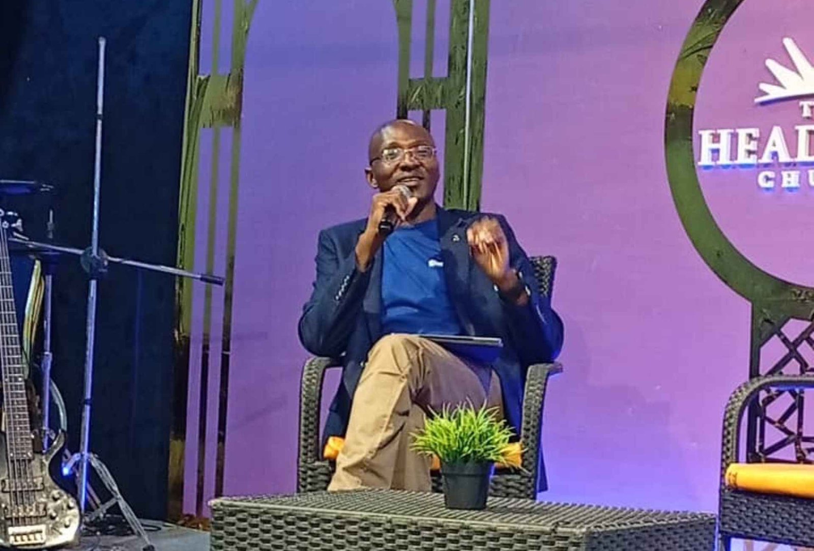 Anzolo at friends connect leading the africa awakening seated